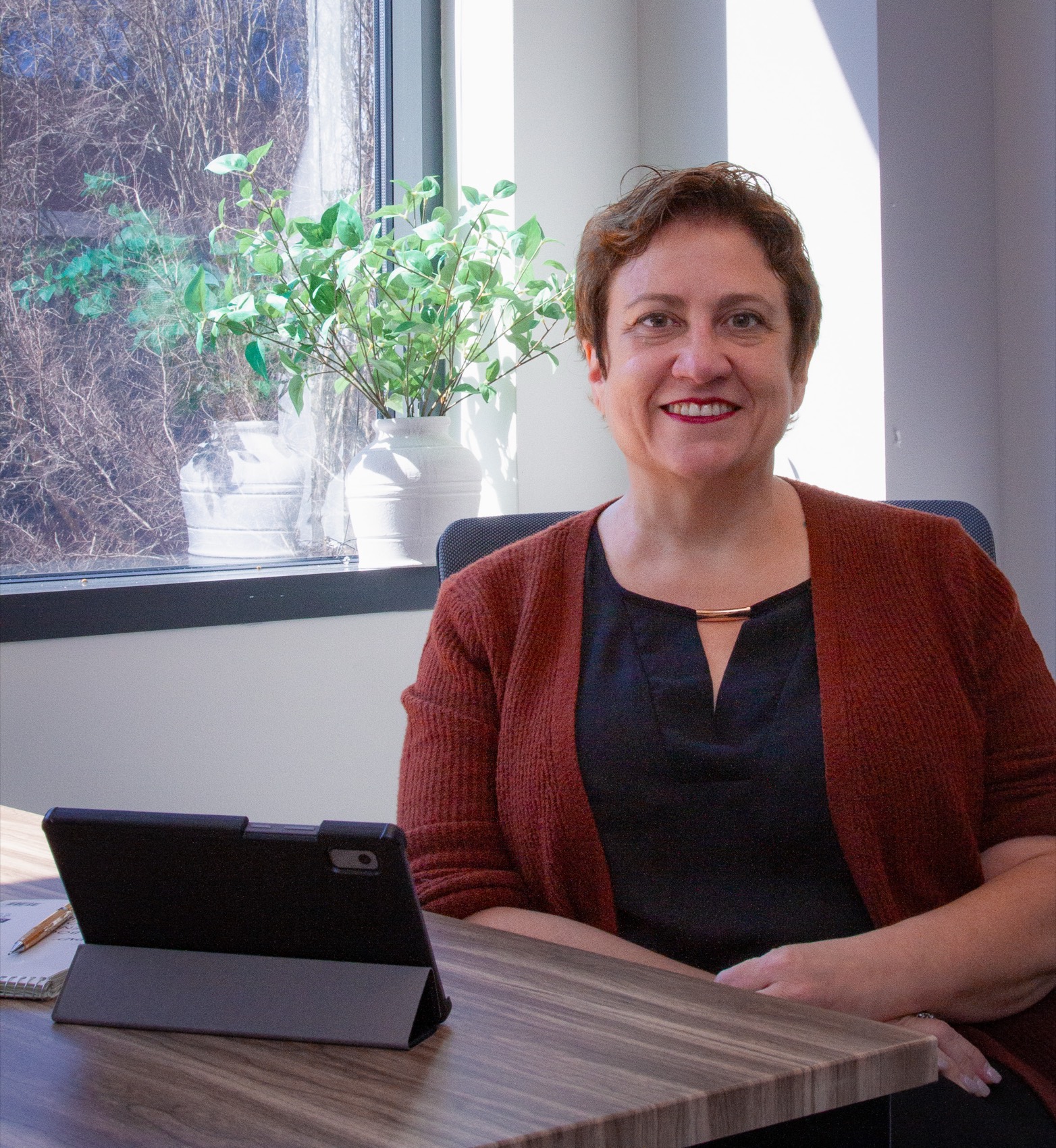 Tracy Bothwell at her desk in the Bothwell Law Office